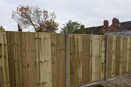 A new close-board fence with concrete posts